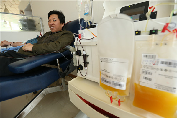 “70后”超市卖肉哥程少海10余年无偿捐献全血、血小板达85次.jpg